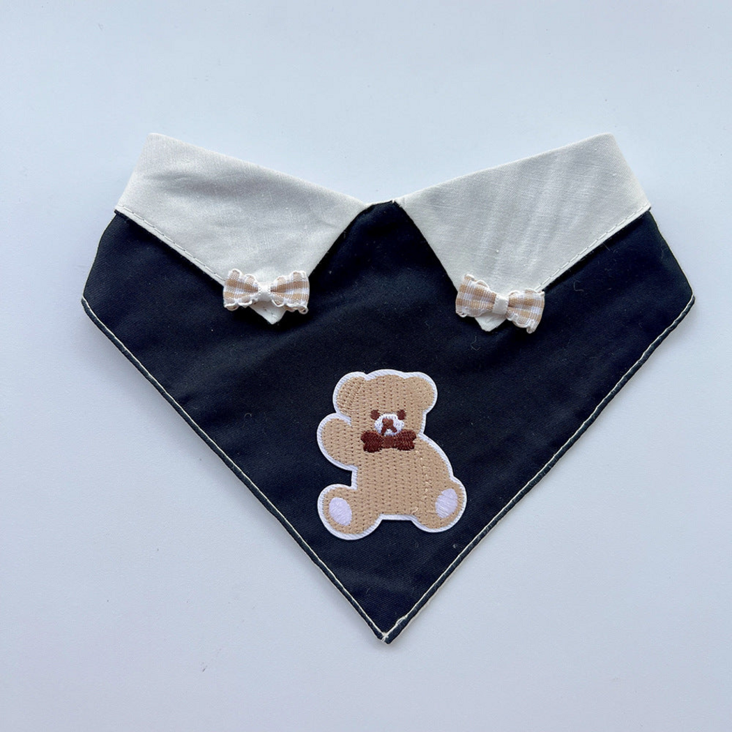 Beige Pet Neckwear design with a black front, white collar points and teddy bear appliqué