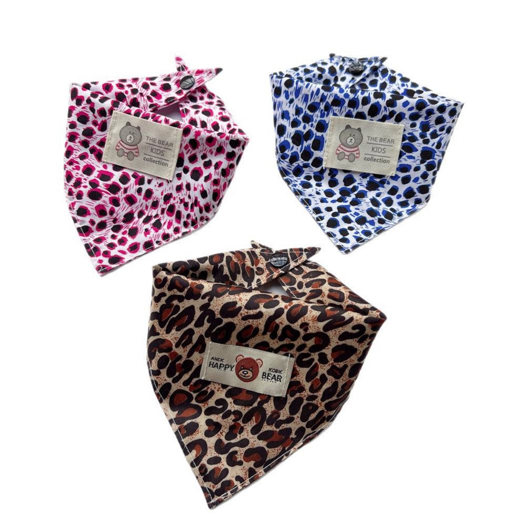 Pink, Blue and Brown leopard-print triangular pet neckwear displayed with snaps fastened
