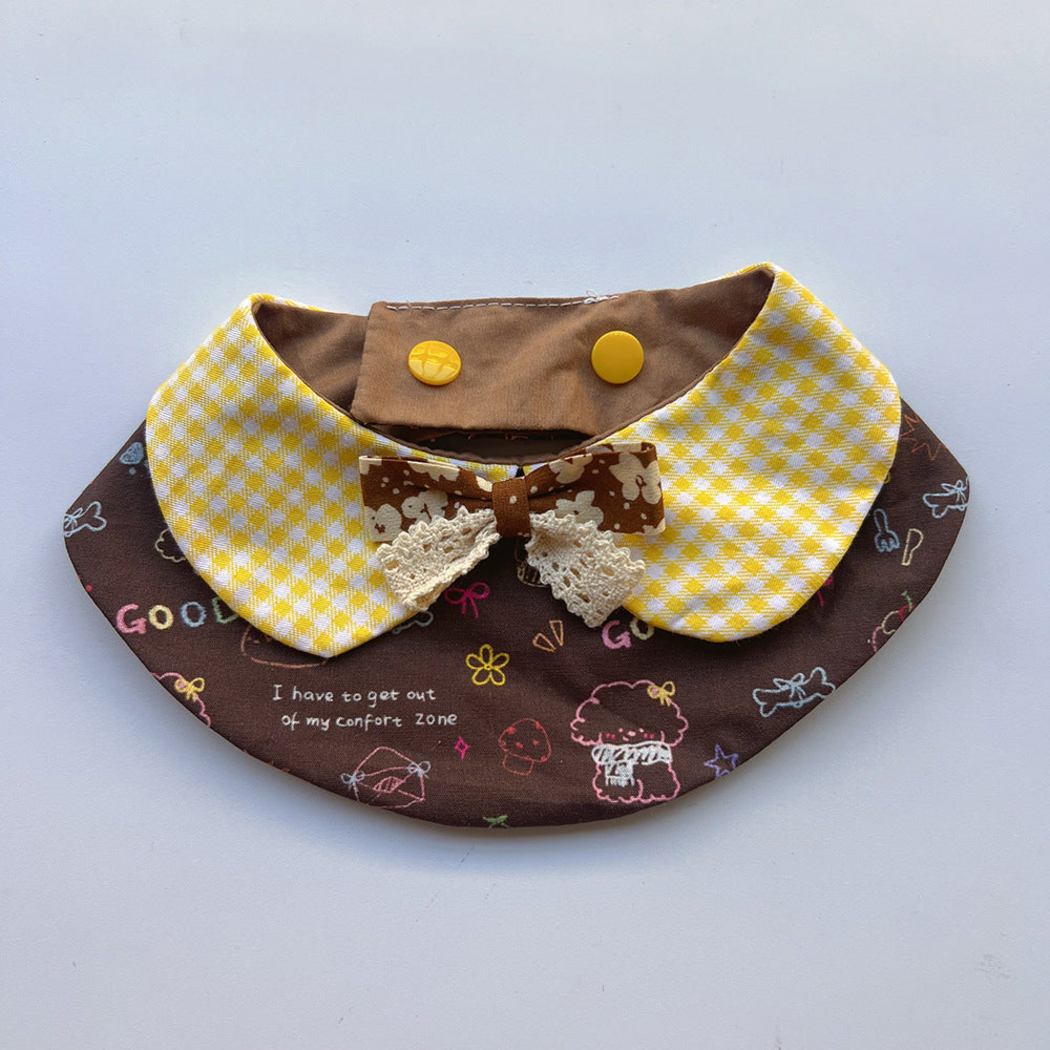 Peter Pan pet neckwear with yellow-and-white gingham panels, brown patterned bow and cream lace-look trim