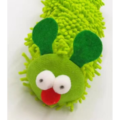 Close view of the green caterpillar cat toy face and tufted front body