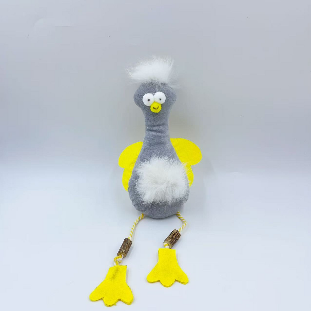 Duck cat toy with a gray body, yellow wings, white tufts and cord legs, front view