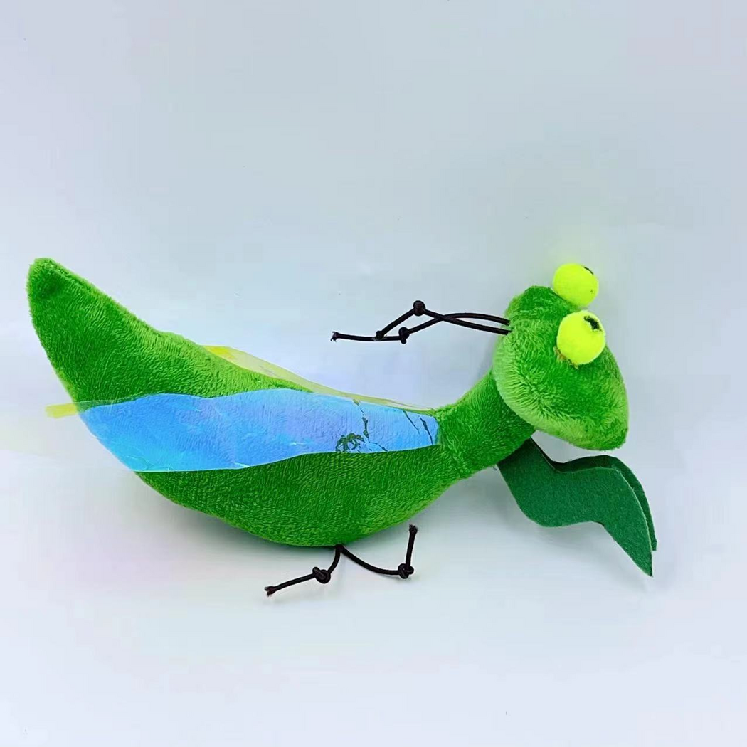 Mantis cat toy with a green body, raised yellow-green eyes, iridescent wings and black cord legs
