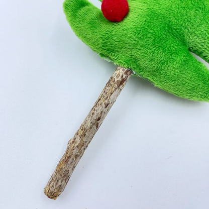 Tree cat toy detail showing the mottled brown stick and green fuzzy surface