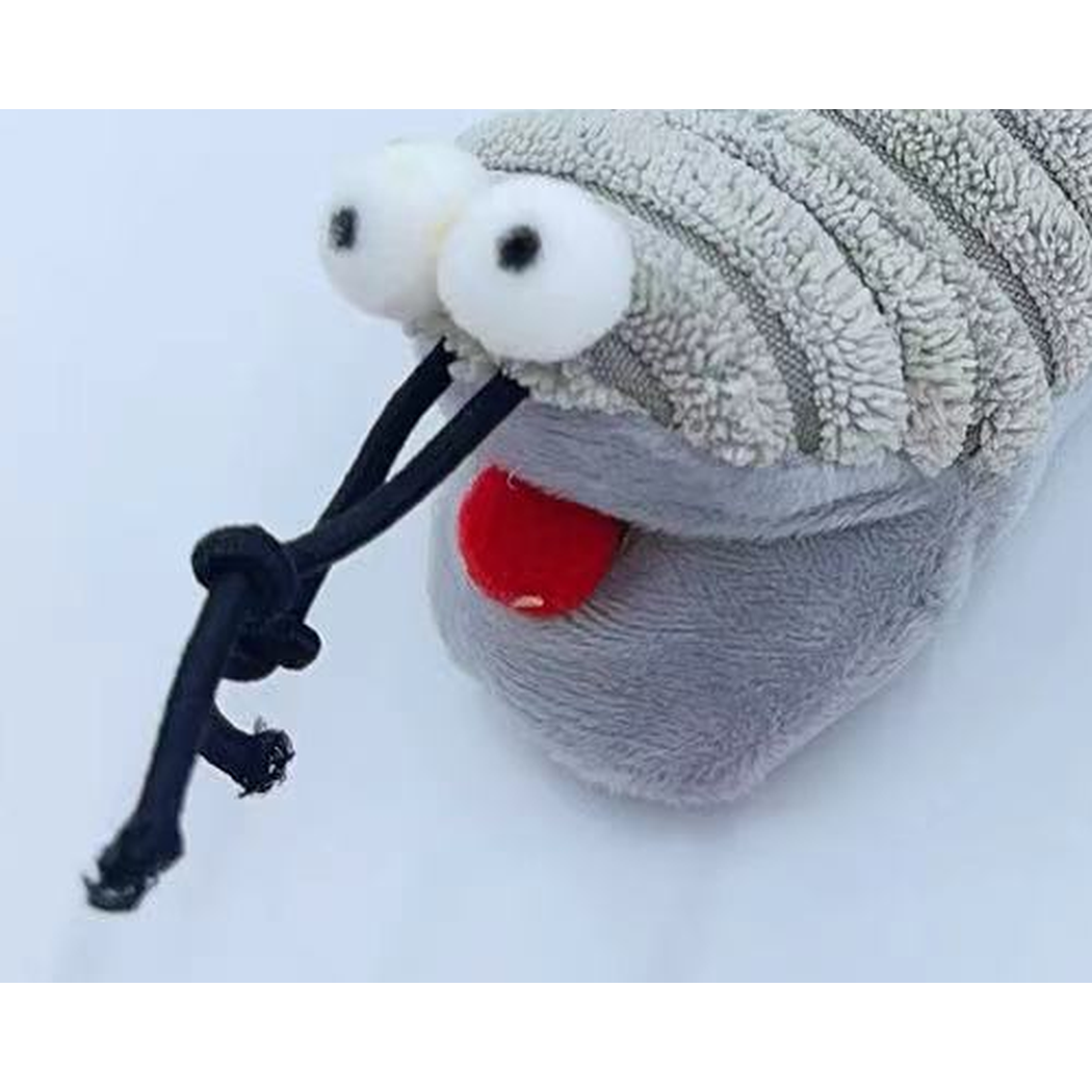 Gray centipede toy face detail with white eyes, red mouth and knotted black cords