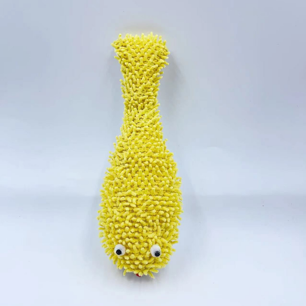 Pufferfish cat toy viewed from above, showing raised eyes, yellow tufting and a red facial accent