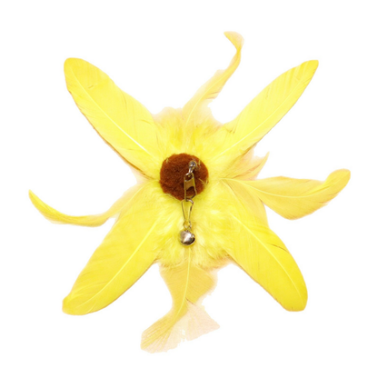 Flower cat toy with yellow feathers, a brown fuzzy center, metal clip and bell on white