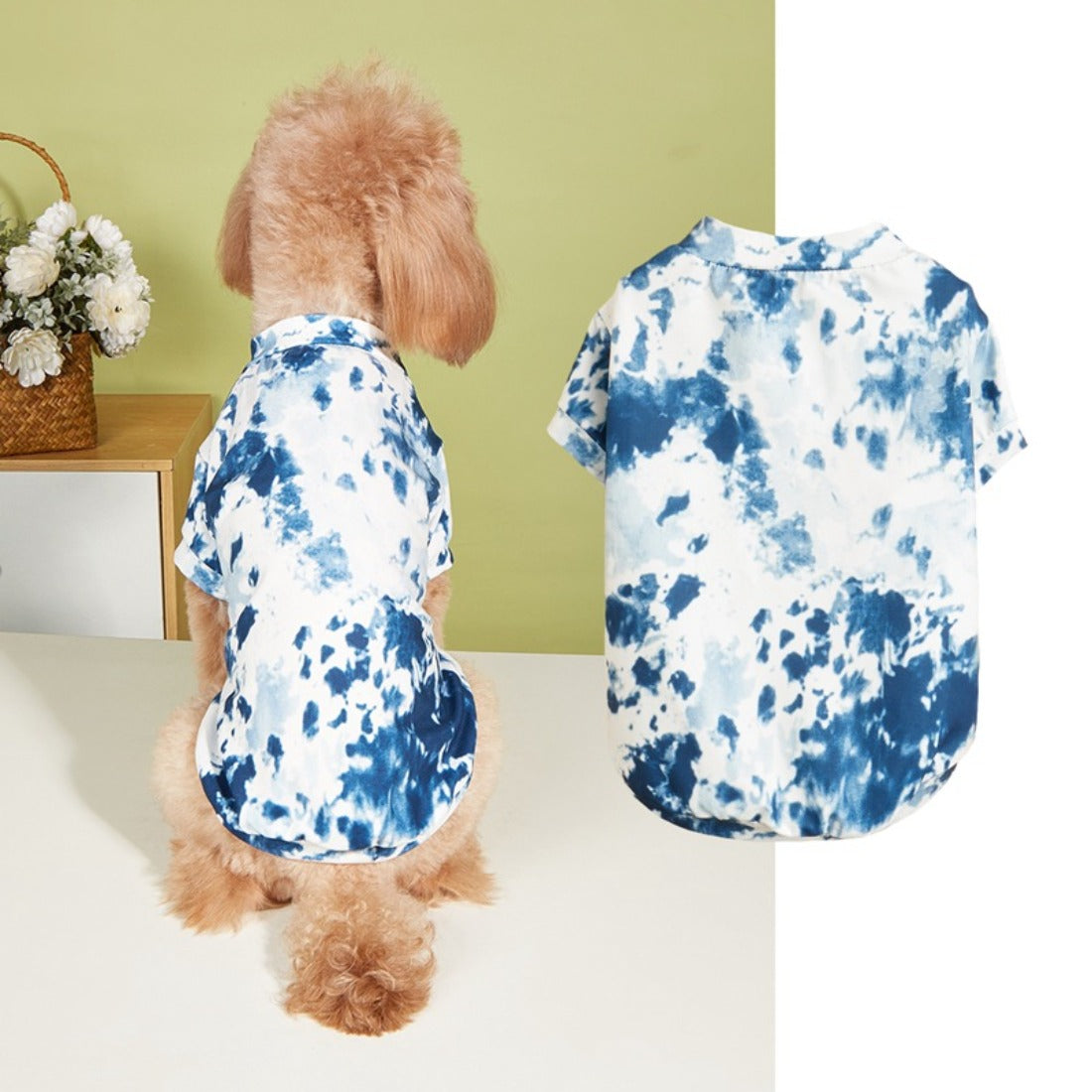 Back view of a dog in a multicolored tie dye t-shirt showing the shirt’s design