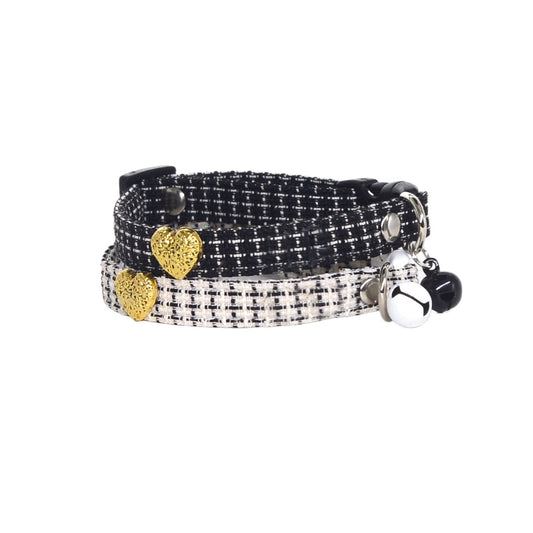 Close-up of Mokka tweed heart cat collar with a small heart-shaped charm