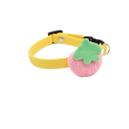 Close-up of the breakaway clasp and strawberry charm on the Mokka cat collar