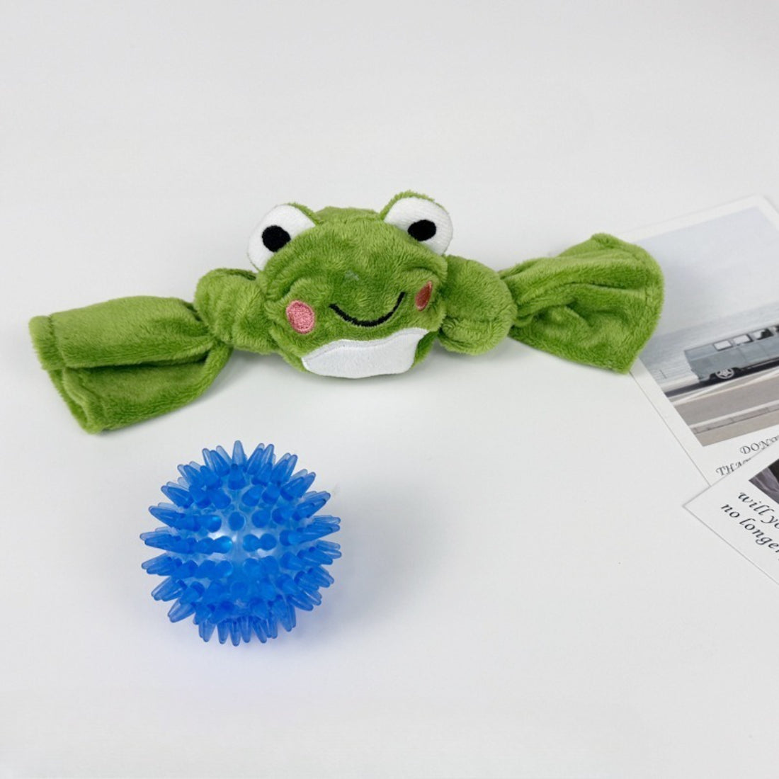 Close-up of Petkin Animal Candy plush dog toy showing detailed stitching and vibrant colors