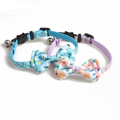 Mokka floral bow tie cat collar laid flat highlighting bow tie design