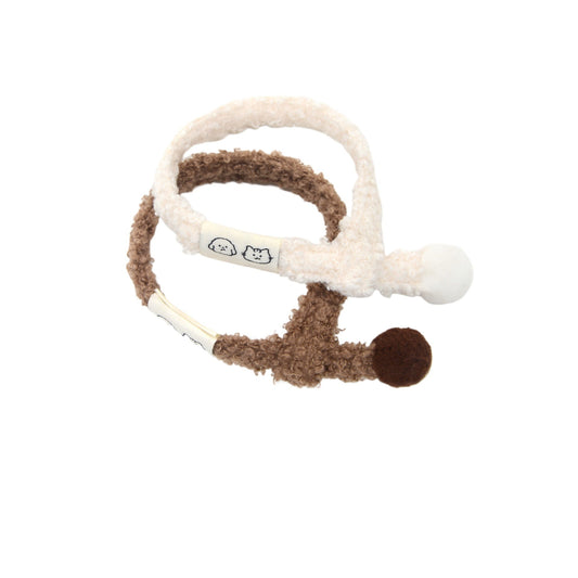 Mokka soft pom pom cat collar in beige with a small bell and adjustable strap