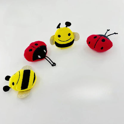Close-up of Moo plush insect cat toy showing textured wings