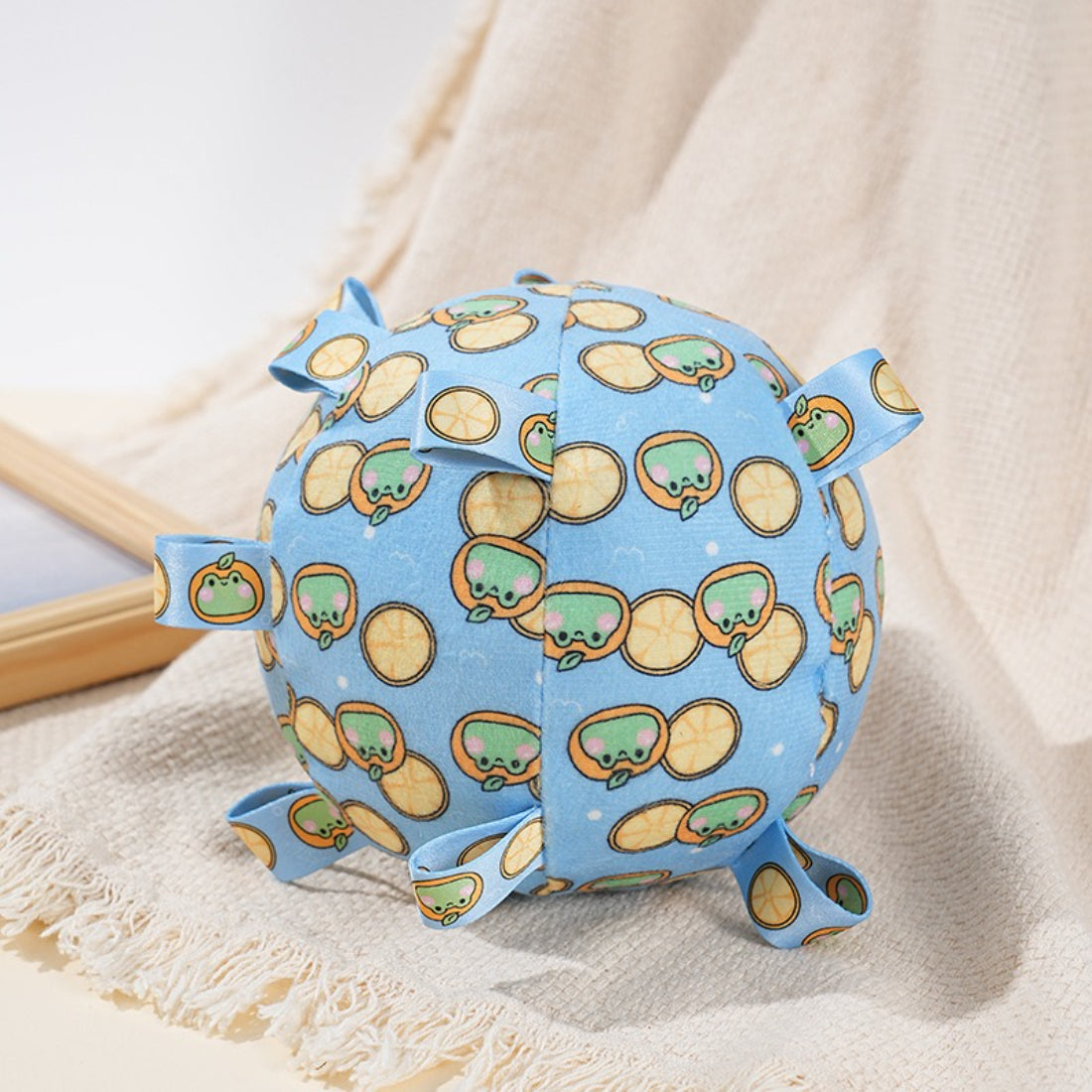 Close-up of Petkin Loop Ball Tug Dog Toy showing textured ball surface