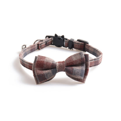 Side view of Mokka soft plaid bow tie cat collar with bell