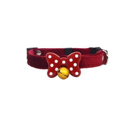 Close-up of Mokka polka dot bow breakaway cat collar showing the buckle and fabric pattern
