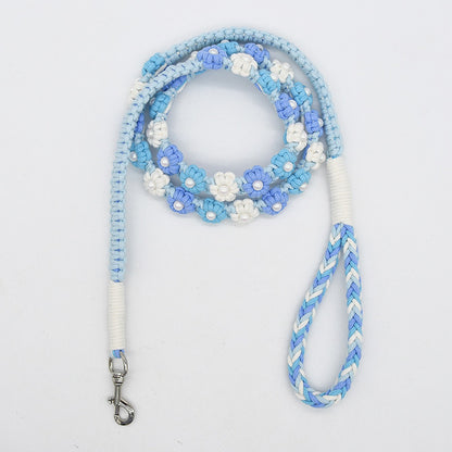 Loofie floral braided dog leash laid out straight on white surface