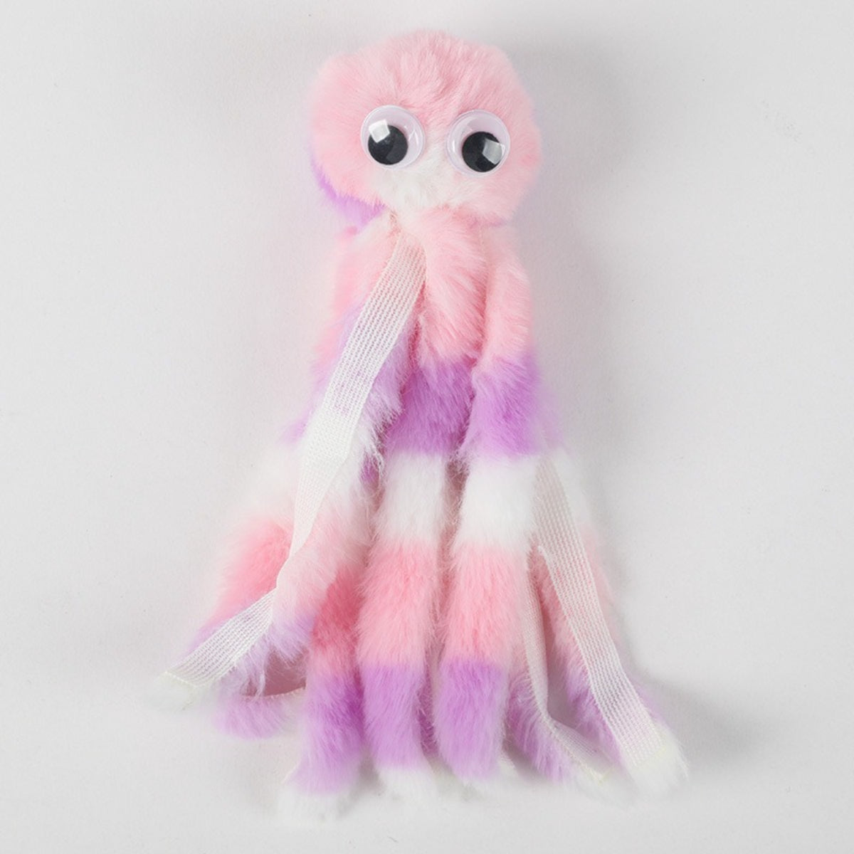 Side view of Petkin plush octopus cat toy showing round body and tentacles