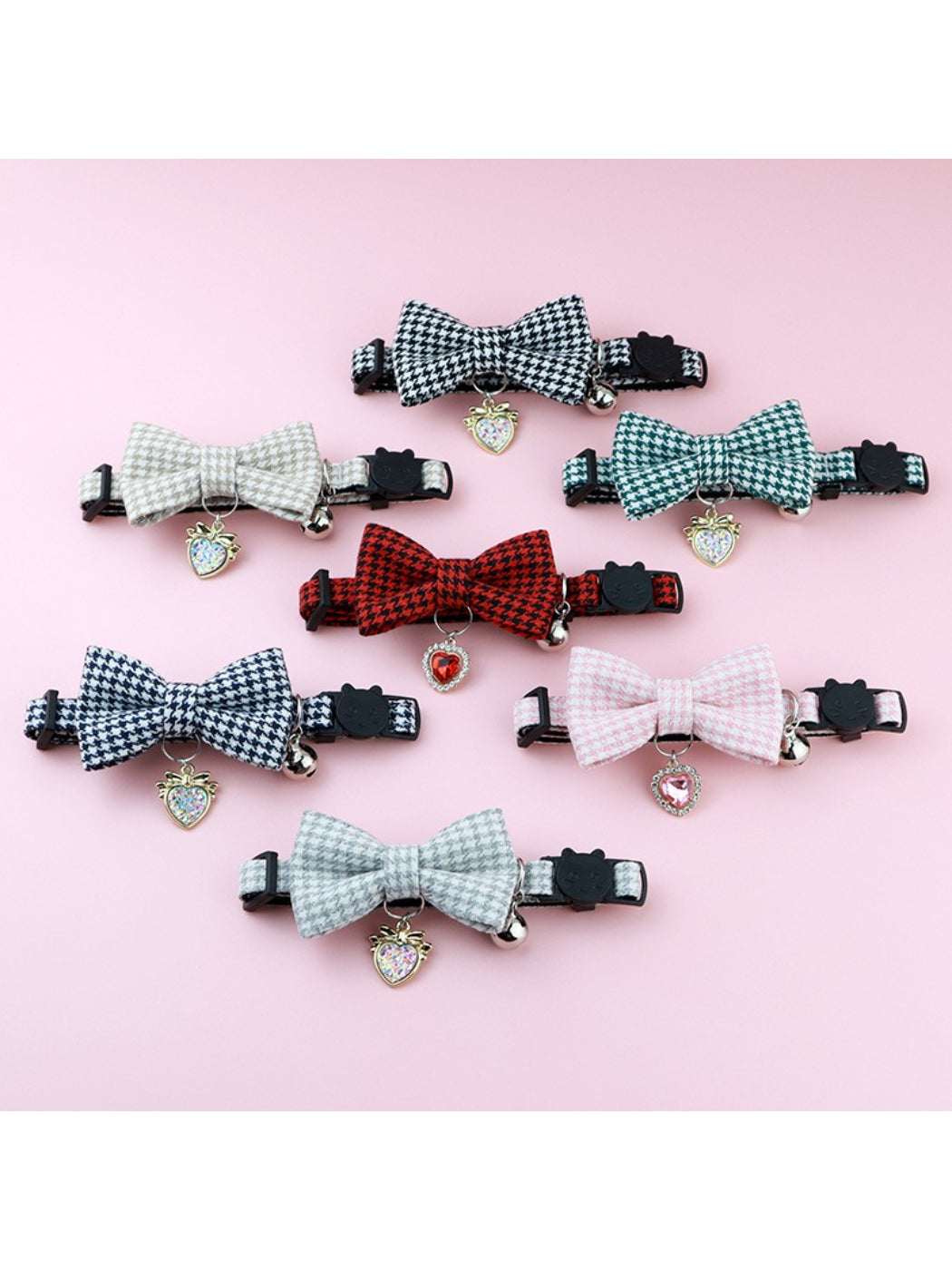 Close-up of Mokka houndstooth bow bell cat collar on white background