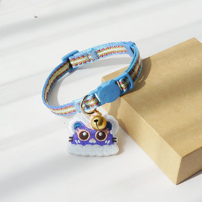 Mokka cat collar laid flat highlighting the tiger head centerpiece