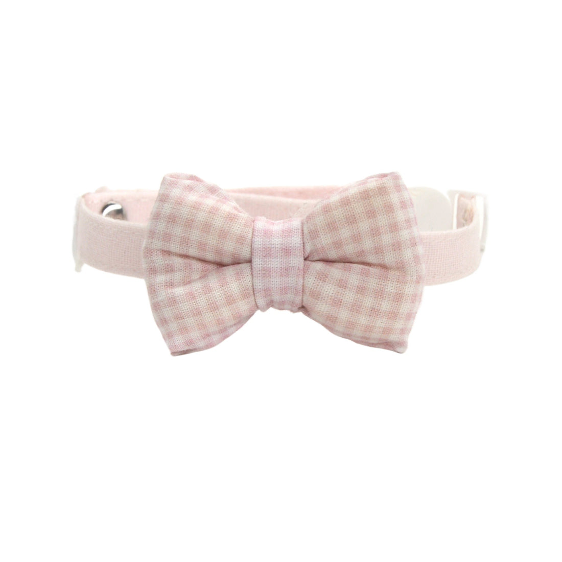 Close-up of Mokka cat collar's soft check pattern and bow detail
