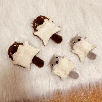 Close-up of plush squirrel kicker cat toy showing textured fur and stitched eyes