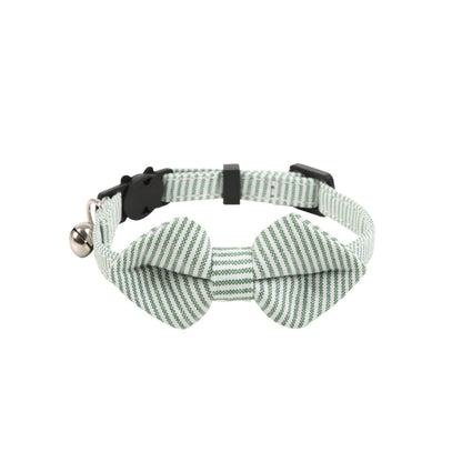 Side view of Mokka striped bow tie cat collar featuring attached bell