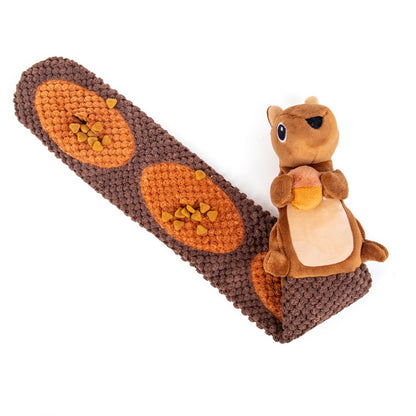 Petkin Squirrel Hide-and-Squeak dog toy held in hand for size reference