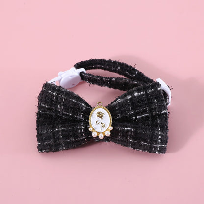 Mokka vintage style bow cat collar shown from above with bow prominent