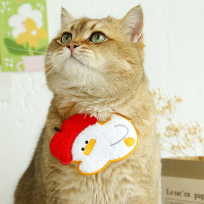Cat wearing Mokka cartoon bib collar looking forward with collar visible