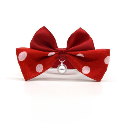 Mokka polka dot bow breakaway cat collar in brown with white dots, shown flat