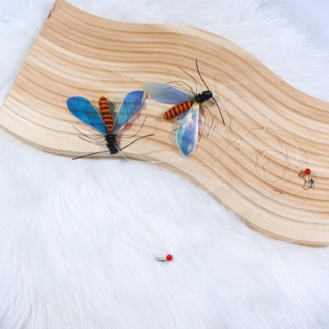 Moo Bee refill attachment for teaser wands shown against a white background