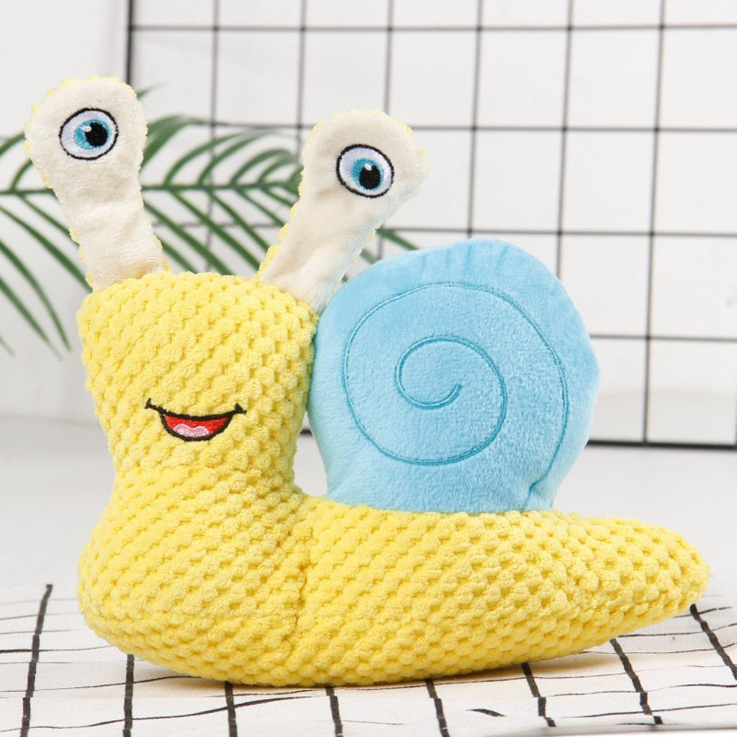 Petkin Snail Plush Dog Toy lying flat with visible snail shell pattern