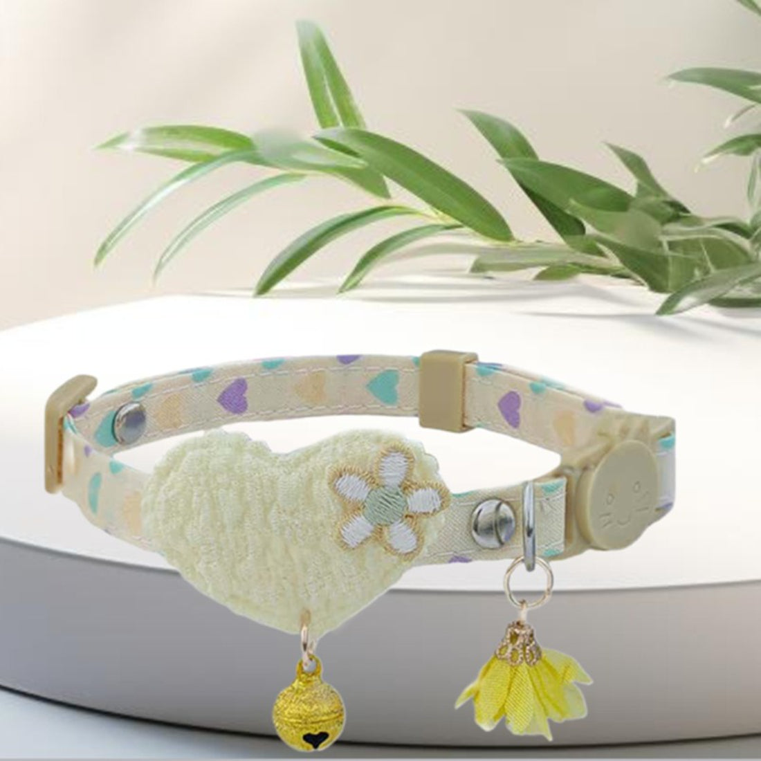 Side view of Mokka Heart Floral Charm Cat Collar with bell attached