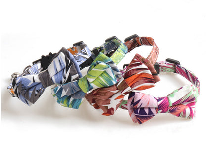 Mokka Tropical Leaf Bow Tie Cat Collar with bell photographed from above