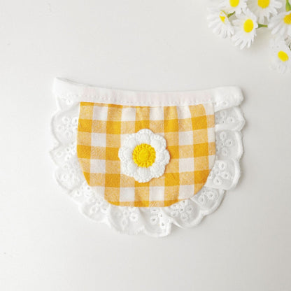 Mokka gingham daisy cat bib worn by a cat, showing fit and style