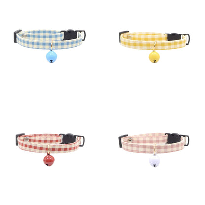 Close-up of Mokka simple gingham cat collar with black buckle and silver bell