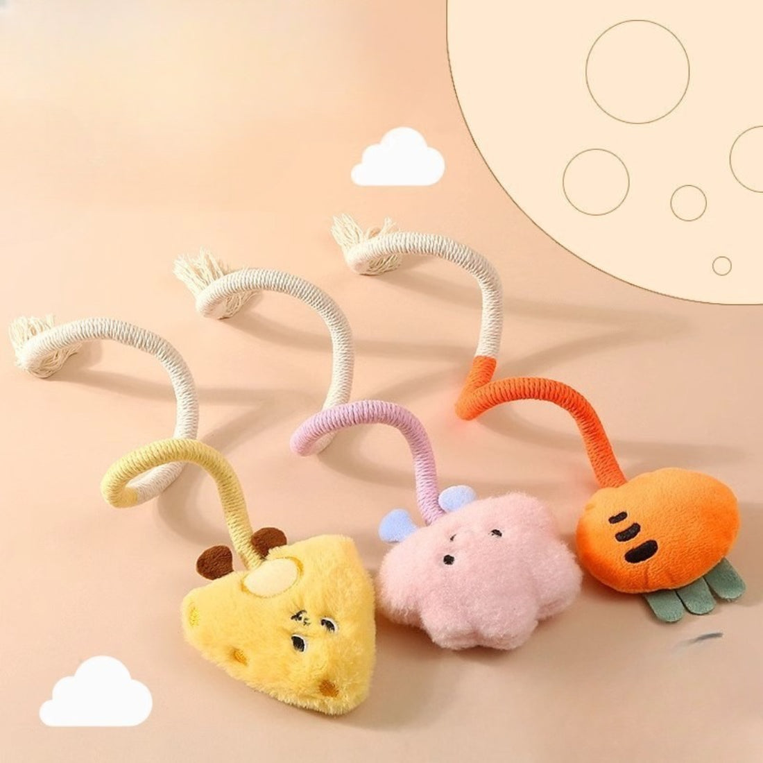 Moo interactive wand cat toy with plush charm and colorful feathers on a wooden stick