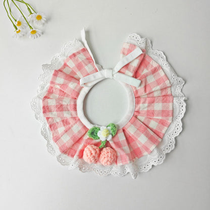 Side view of Mokka gingham cherry cat collar highlighting metal D-ring and bell