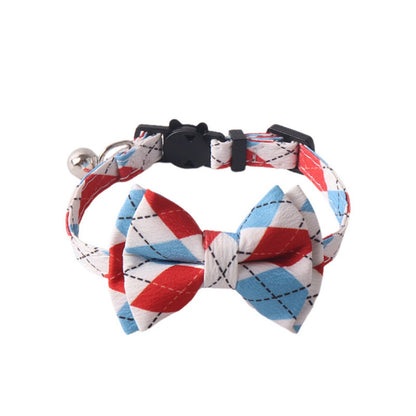 Mokka Argyle bow tie cat collar worn by a cat