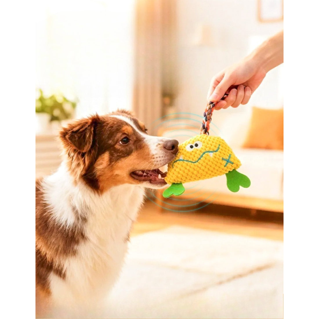 Petkin soft plush monster dog toy lying on white background with visible rope ends
