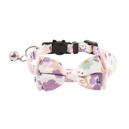 Mokka cat collar with floral and gingham bow shown from above