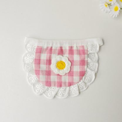 Mokka gingham daisy cat bib displayed flat highlighting shape and pattern
