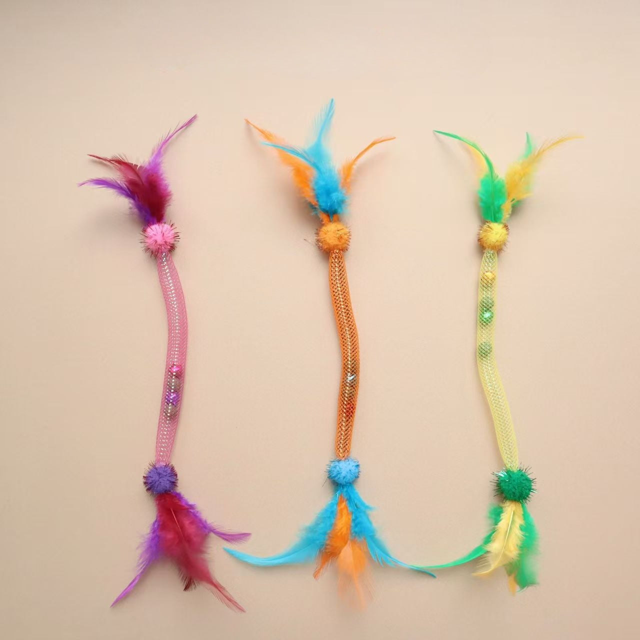 Moo Sparkle Feather Toss interactive cat toy with colorful feathers on a stick