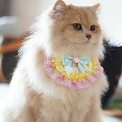 Side view of Mokka Colourblock Bow Cat Bib displaying colourblock design
