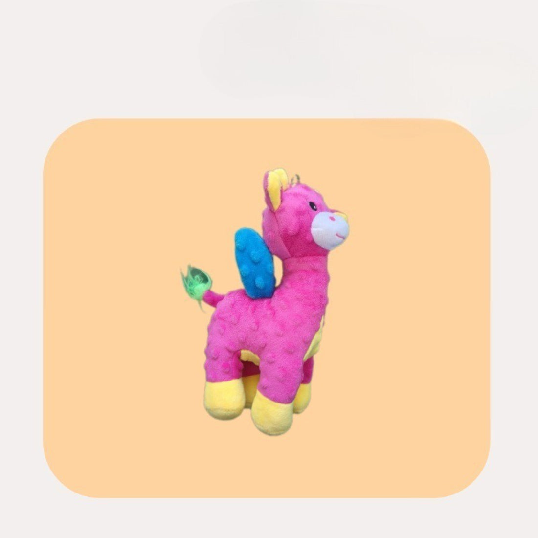 Close-up of Petkin Winged Horse dog plush toy showing detailed wings and face