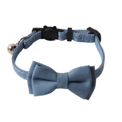 Mokka breakaway cat collar with striped bow tie shown in natural light