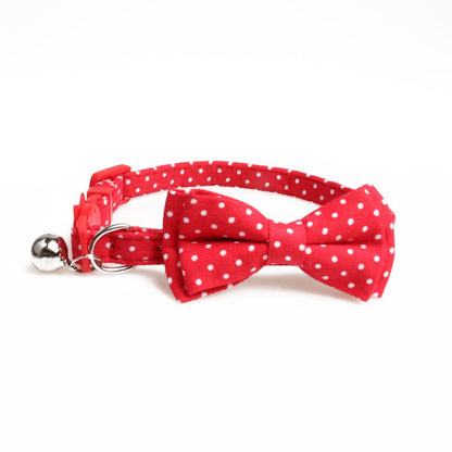 Mokka adjustable cat collar with red polka dot bow tie worn by a cat