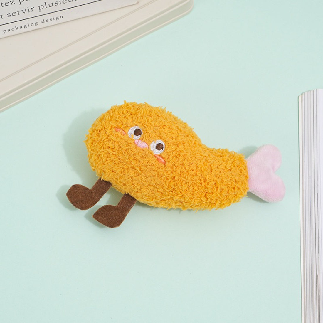 Moo food plush cat toy with visible squeaker inside for interactive play