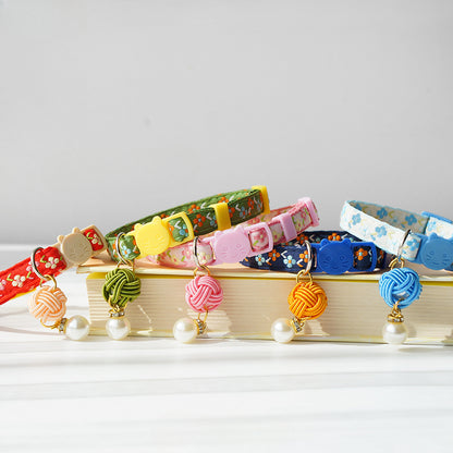 Mokka Pearl Flower Cat Collar displayed on a white background